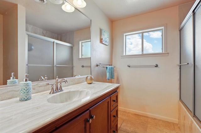 1595 W Bosque Loop, Bosque Farms, NM 87068 - bathroom featuring vanity and tile patterned flooring