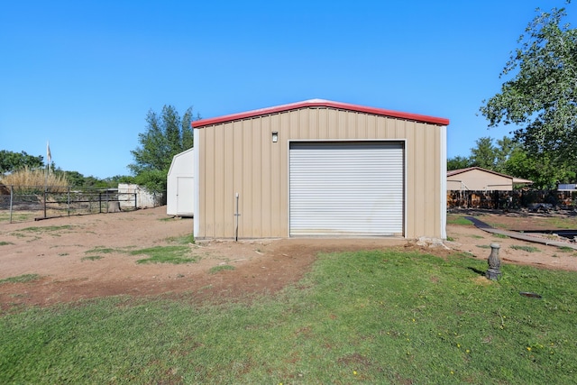 1595 W Bosque Loop, Bosque Farms, NM 87068 - detached garage featuring driveway