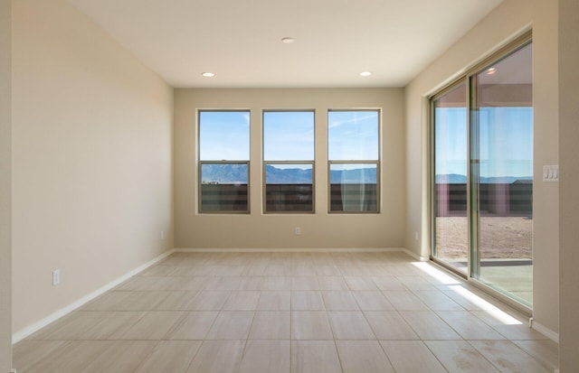 8328 Bronte Ln NW, Albuquerque, NM 87120 - empty room featuring healthy amount of natural light, recessed lighting, and baseboards