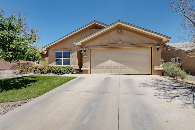 1250 Carnival Ave NW, Los Lunas, NM 87031 - single story home with stucco siding, driveway, an attached garage, and a front yard