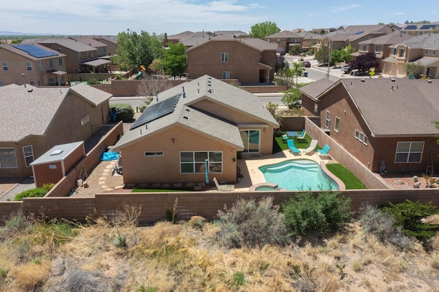 1250 Carnival Ave NW, Los Lunas, NM 87031 - aerial view of residential area featuring a pool