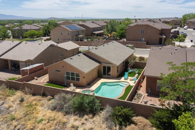 1250 Carnival Ave NW, Los Lunas, NM 87031 - aerial view of residential area with a mountainous background and a pool
