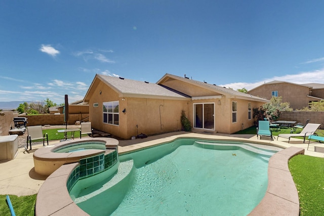1250 Carnival Ave NW, Los Lunas, NM 87031 - view of pool featuring a patio area, a fenced backyard, and a pool with connected hot tub