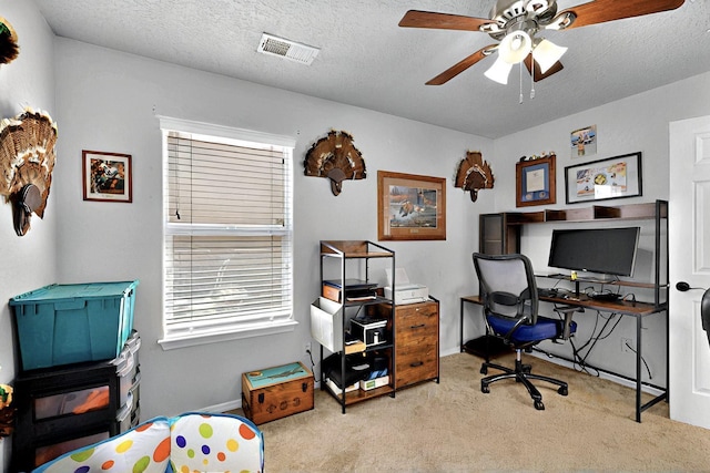 1250 Carnival Ave NW, Los Lunas, NM 87031 - carpeted office with ceiling fan, baseboards, and a textured ceiling