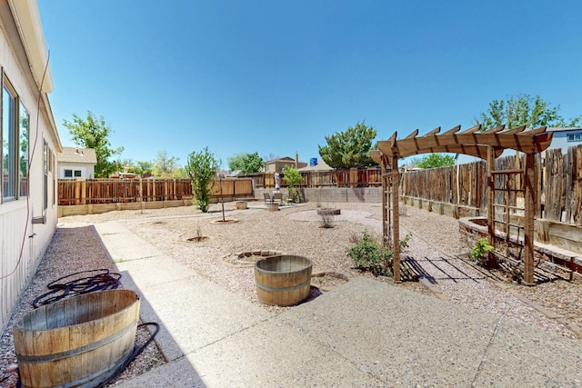 1321 Elkslip Dr NE, Rio Rancho, NM 87144 - fenced backyard with a patio area