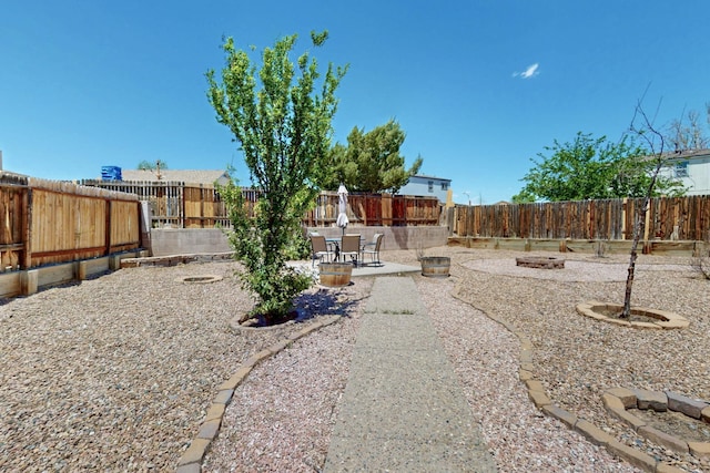1321 Elkslip Dr NE, Rio Rancho, NM 87144 - fenced backyard featuring a patio
