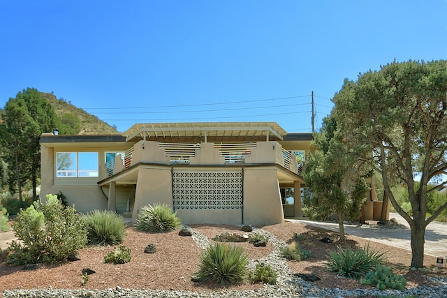 1106 Warm Sands Dr SE, Albuquerque, NM 87123 - view of front of house with stucco siding