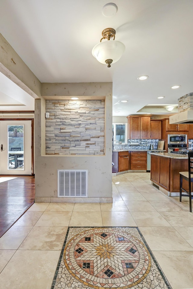 1106 Warm Sands Dr SE, Albuquerque, NM 87123 - living area featuring light tile patterned floors and recessed lighting
