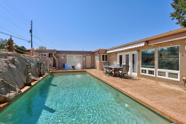 1106 Warm Sands Dr SE, Albuquerque, NM 87123 - outdoor pool featuring french doors and a patio