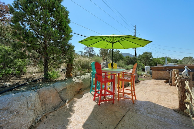 1106 Warm Sands Dr SE, Albuquerque, NM 87123 - view of patio / terrace featuring outdoor dining space