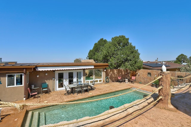 1106 Warm Sands Dr SE, Albuquerque, NM 87123 - view of pool with french doors and a patio area