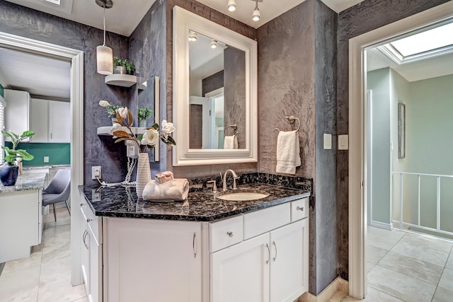 1106 Warm Sands Dr SE, Albuquerque, NM 87123 - bathroom with vanity and tile patterned floors