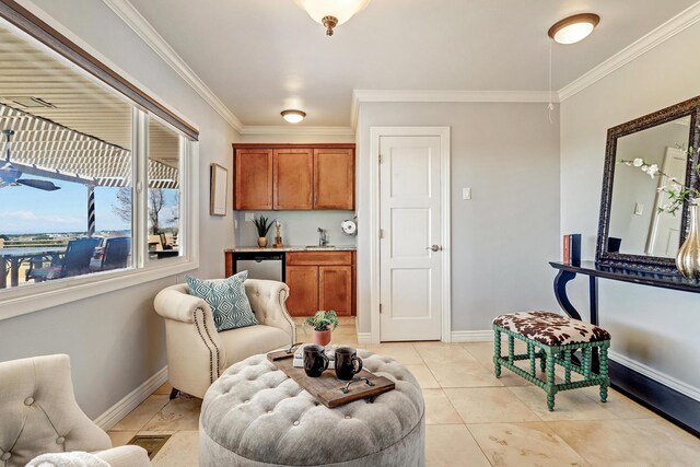 1106 Warm Sands Dr SE, Albuquerque, NM 87123 - living room featuring ornamental molding, baseboards, and light tile patterned floors