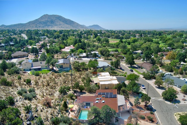 1106 Warm Sands Dr SE, Albuquerque, NM 87123 - bird's eye view of a mountain backdrop and a pool area