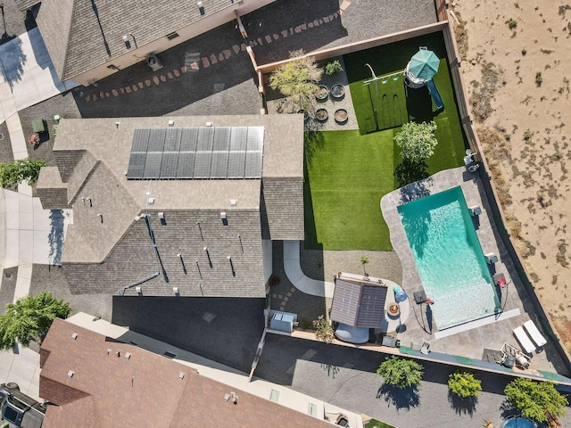 drone / aerial view of a pool area