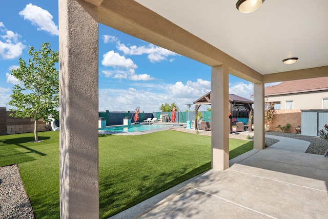 view of yard featuring a gazebo and a patio area