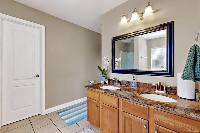 5727 Cibola Dr NE, Rio Rancho, NM 87144 - bathroom featuring tile patterned floors and double vanity