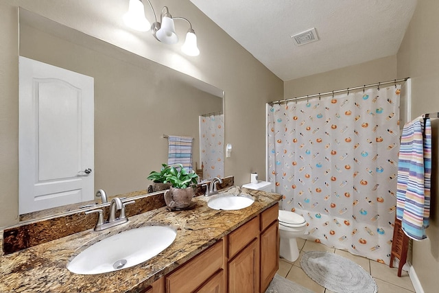 5727 Cibola Dr NE, Rio Rancho, NM 87144 - bathroom with tile patterned floors, double vanity, and a shower with curtain