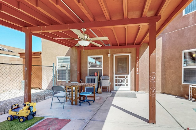 5727 Cibola Dr NE, Rio Rancho, NM 87144 - view of patio featuring a ceiling fan and outdoor dining space