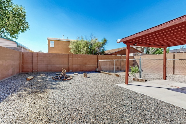 5727 Cibola Dr NE, Rio Rancho, NM 87144 - fenced backyard with a patio area
