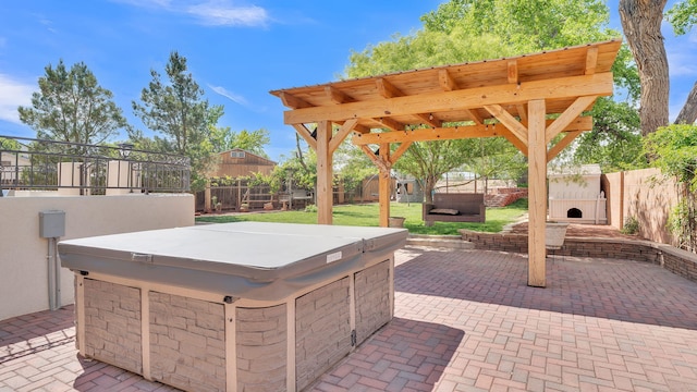 2815 Linda Pl SW, Albuquerque, NM 87105 - view of patio / terrace with a hot tub, a fenced backyard, and a gazebo