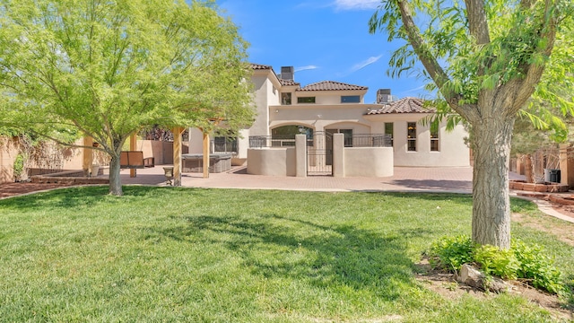 2815 Linda Pl SW, Albuquerque, NM 87105 - rear view of property featuring a tile roof, stucco siding, a chimney, a patio area, and a gate