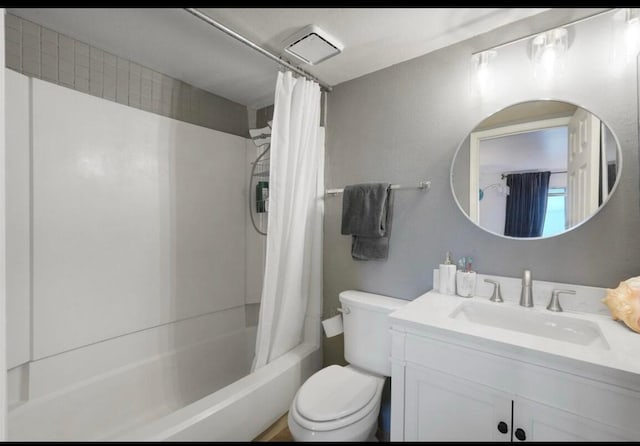 3301 Monroe St NE Unit D45, Albuquerque, NM 87110 - bathroom featuring toilet, vanity, and shower / bath combo with shower curtain