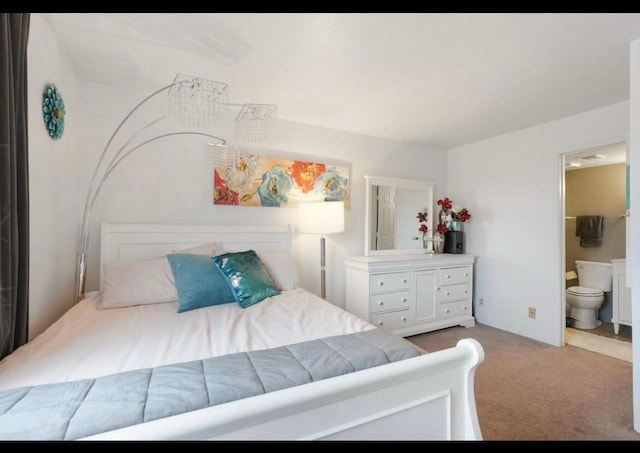 3301 Monroe St NE Unit D45, Albuquerque, NM 87110 - bedroom featuring carpet floors and ensuite bath