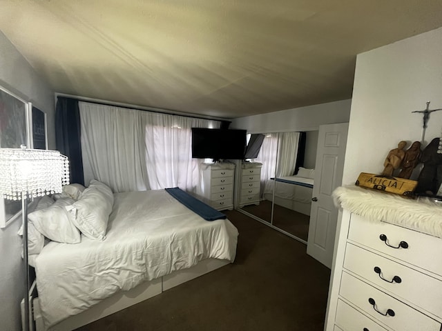 3301 Monroe St NE Unit D45, Albuquerque, NM 87110 - bedroom featuring dark carpet