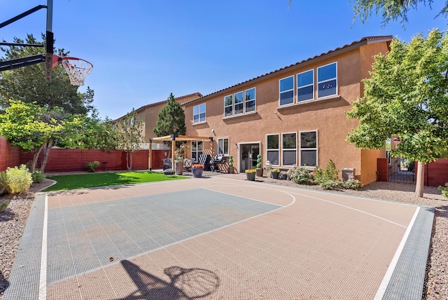 3515 Colina Serena Pl NE, Rio Rancho, NM 87124 - view of basketball court with basketball court and a fenced backyard