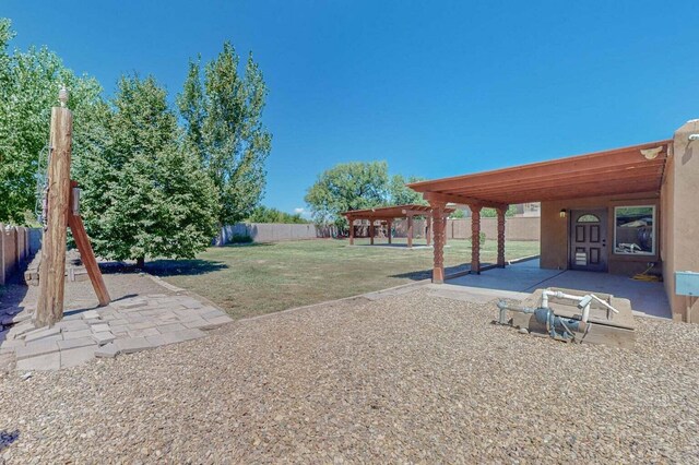 501 Calle De La Angel, Bernalillo, NM 87004 - view of yard featuring a patio area
