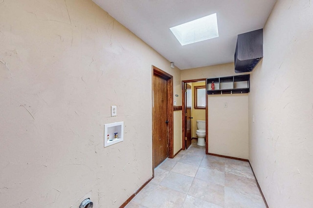 501 Calle De La Angel, Bernalillo, NM 87004 - washroom with a skylight, hookup for a washing machine, and baseboards
