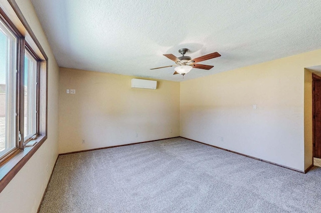 501 Calle De La Angel, Bernalillo, NM 87004 - spare room with healthy amount of natural light, light colored carpet, a ceiling fan, a textured ceiling, and baseboards