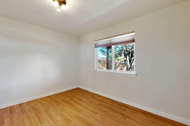 9737 Academy St NW, Albuquerque, NM 87114 - unfurnished room featuring baseboards and light wood-style floors
