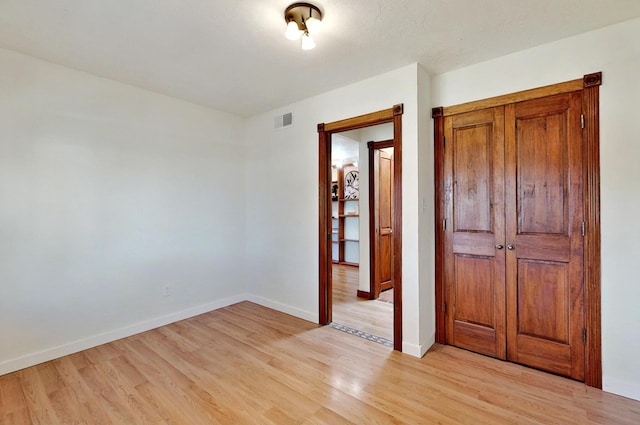 9737 Academy St NW, Albuquerque, NM 87114 - spare room with light wood-type flooring and baseboards