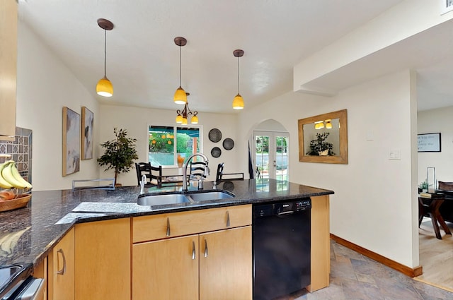 9737 Academy St NW, Albuquerque, NM 87114 - kitchen featuring dishwasher, a sink, arched walkways, stone finish flooring, and dark stone countertops