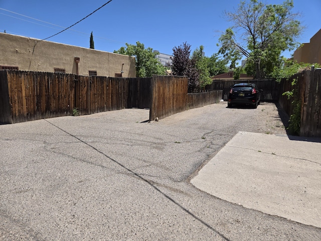 1017-1021 6th St NW, Albuquerque, NM 87102 - view of yard with fence and driveway