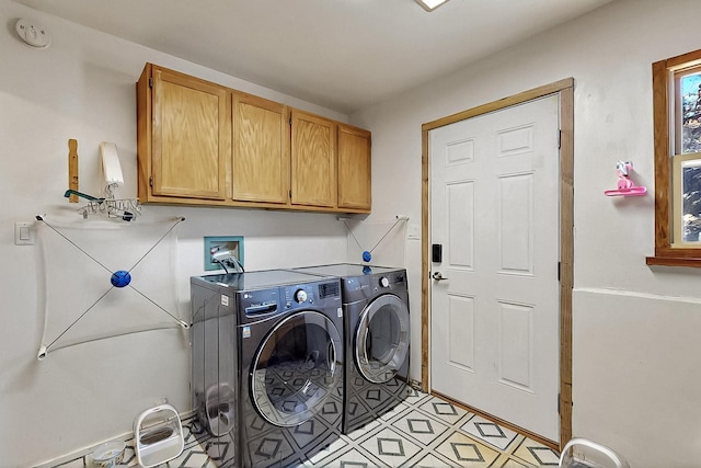 26 Apache Creek Rd, Santa Fe, NM 87505 - laundry room featuring cabinet space and washer and dryer