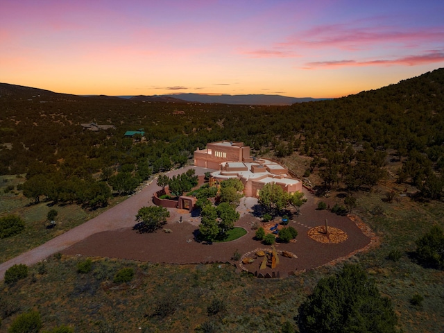 28 Canon Escondido, Sandia Park, NM 87047 - aerial view at dusk of a wooded view