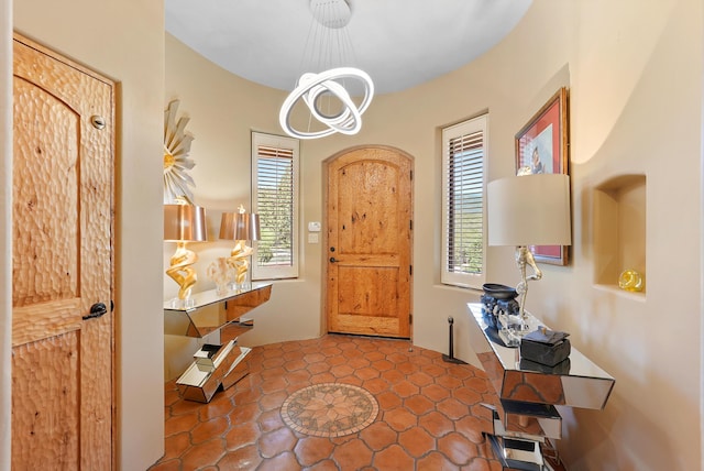 28 Canon Escondido, Sandia Park, NM 87047 - foyer featuring plenty of natural light and a chandelier
