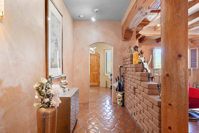 28 Canon Escondido, Sandia Park, NM 87047 - entryway featuring arched walkways, beamed ceiling, and tile patterned floors