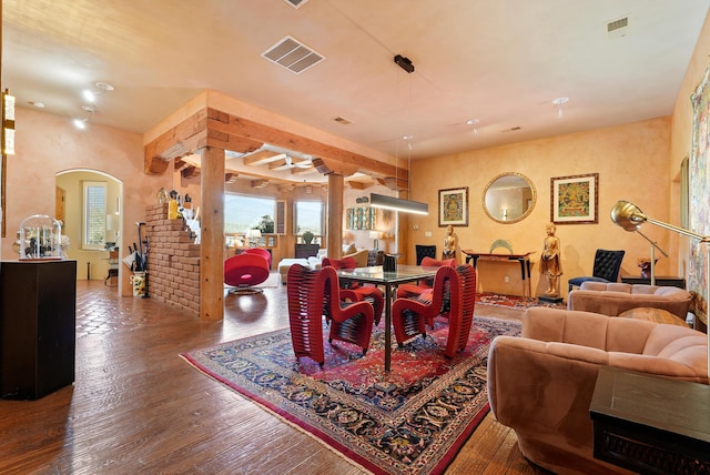 28 Canon Escondido, Sandia Park, NM 87047 - dining area featuring arched walkways and wood finished floors