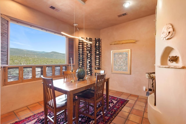 28 Canon Escondido, Sandia Park, NM 87047 - dining space featuring tile patterned floors
