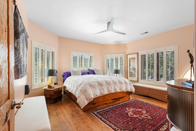 28 Canon Escondido, Sandia Park, NM 87047 - bedroom with wood finished floors and a ceiling fan