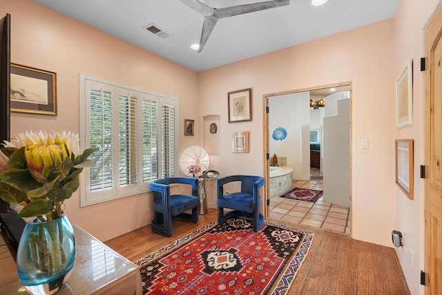 28 Canon Escondido, Sandia Park, NM 87047 - living area featuring wood finished floors and recessed lighting