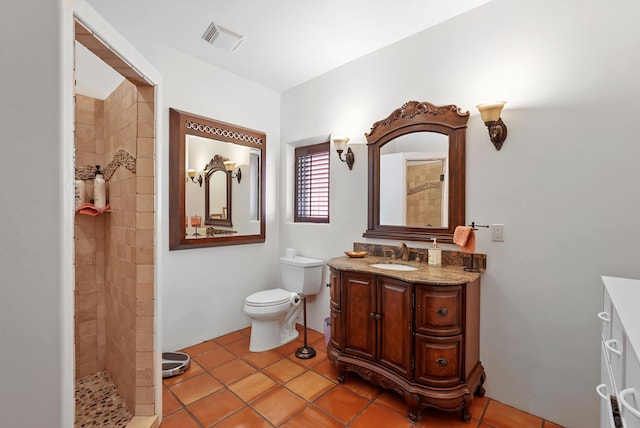28 Canon Escondido, Sandia Park, NM 87047 - full bathroom featuring tiled shower, vanity, and tile patterned flooring
