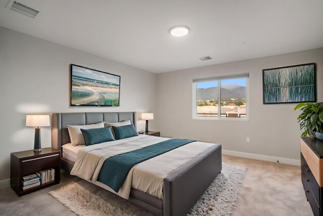 801 Horned Owl Dr NE, Albuquerque, NM 87122 - bedroom with light carpet and baseboards