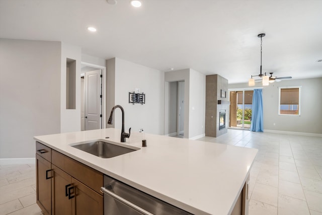 801 Horned Owl Dr NE, Albuquerque, NM 87122 - kitchen with a sink, open floor plan, a ceiling fan, recessed lighting, and light countertops