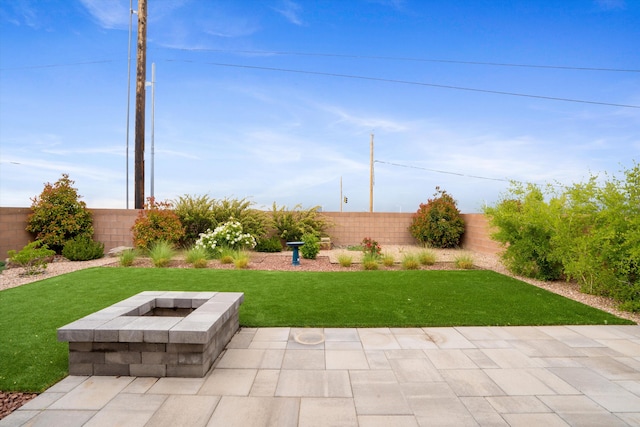 801 Horned Owl Dr NE, Albuquerque, NM 87122 - view of yard with a fire pit and a patio