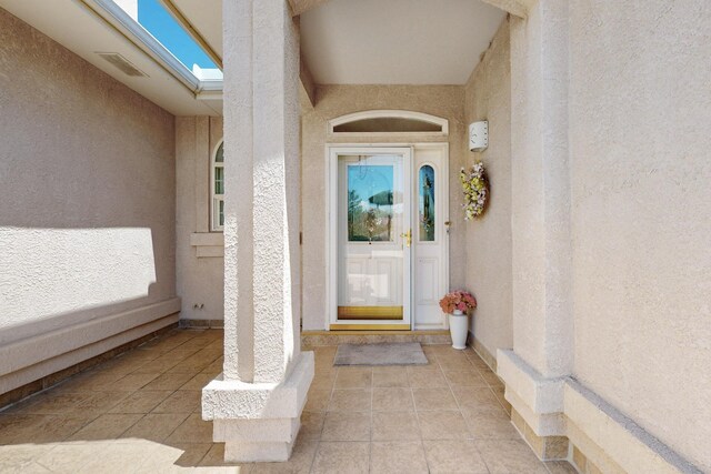10320 Durham St NW, Albuquerque, NM 87114 - view of exterior entry featuring stucco siding